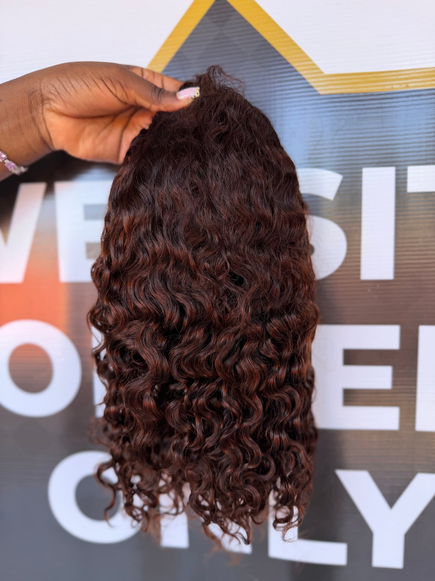 Famous Jerry curls Brown
